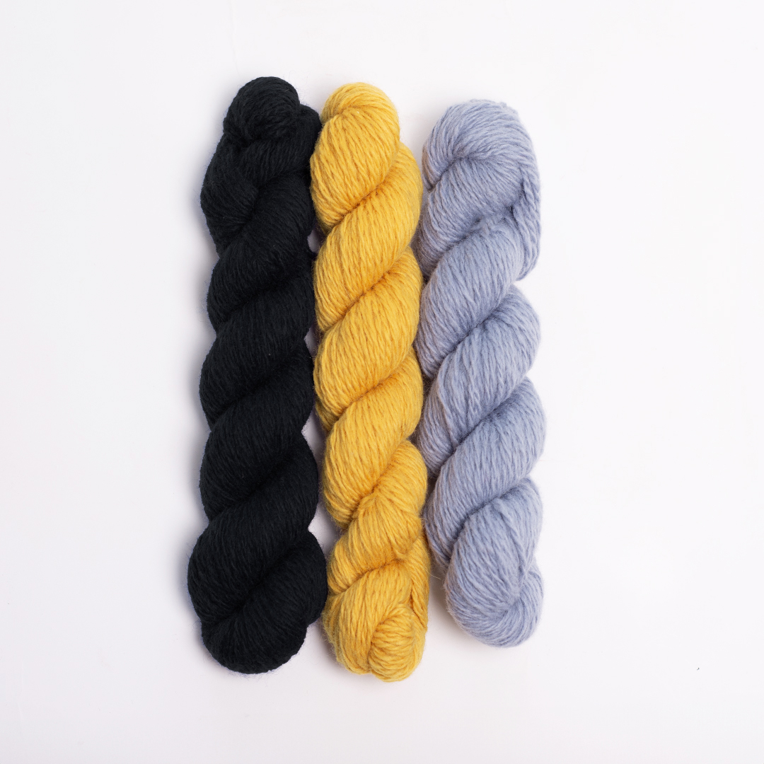 mYak_Yarns_Mini Skeins_Black Petunia Botton d'oro Stone Blue_